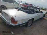 ✅ 1991 Jaguar XJS • VIN: SAJJNADW4DM175201 • Lot: 75993474. Listed on Copart with 35,810 mi. Free auction sales archive from the USA and detailed vehicle history report at DreamBid. Image 3.