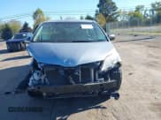 ✅ 2014 Toyota Sienna L • VIN: 5TDZK3DC5ES506922 • Lot: 43387654. Listed on IAAI with 118,733 mi. Free auction sales archive from the USA and detailed vehicle history report at DreamBid. Image 13.