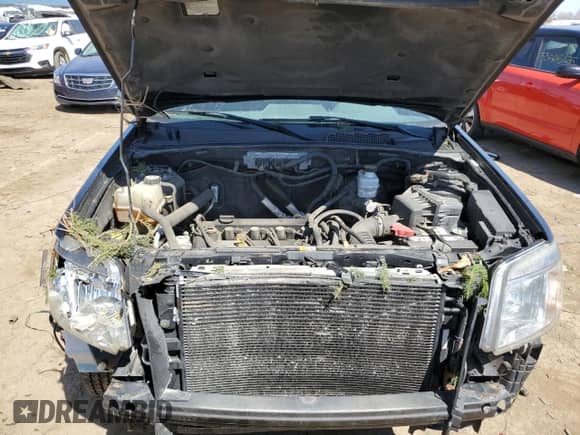 2009 Mercury Mariner Premier with VIN 4M2CU97719KJ08051, listed as a Copart auction lot 53328965 with 98,229 mi miles and Clean title. Bid and sale history available at DreamBid. Image 12.