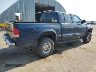 2000 Dodge Dakota Sport z VIN 1B7GG2AN8YS665678, wystawiony jako Copart lot #63878554 z przebiegiem 92 470 mil mil oraz Szkoda całkowita • Salvage title. Historia ofert i sprzedaży dostępna na DreamBid. Obrazek 3.