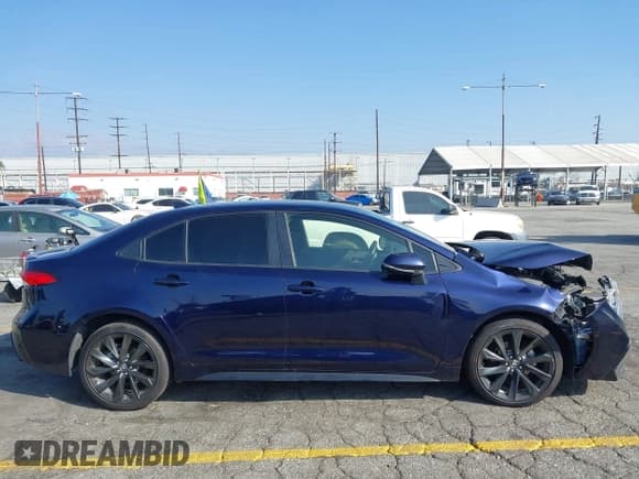 ✅ 2023 Toyota Corolla Hybrid LE • VIN: JTDBCMFEXPJ005589 • Lot: 43373527. Listed on IAAI with 79,564 mi. Free auction sales archive from the USA and detailed vehicle history report at DreamBid. Image 14.