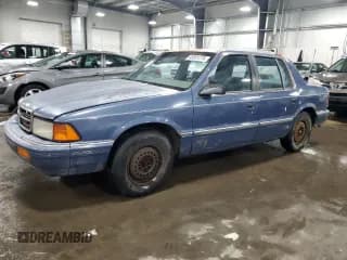 ✅ 1991 Dodge Spirit • VIN: 1B3XA46K9MF628235 • Lot: 83581274. Listed on Copart with 117,774 mi. Free auction sales archive from the USA and detailed vehicle history report at DreamBid. Image 1.