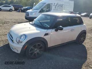 2009 MINI Hardtop with VIN WMWMF33569TT69396, listed as a Copart auction lot 81226515 with 63,929 mi miles and Salvage title. Bid and sale history available at DreamBid. Image 1.