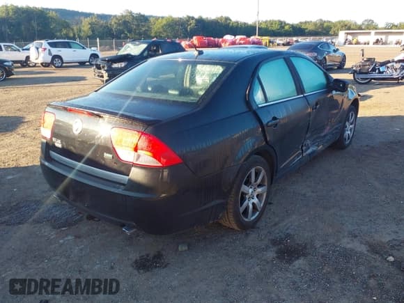 ✅ 2010 Mercury Milan Premier • VIN: 3MEHM0JG7AR656327 • Lot: 43084732. Listed on IAAI with 110,469 mi. Free auction sales archive from the USA and detailed vehicle history report at DreamBid. Image 4.