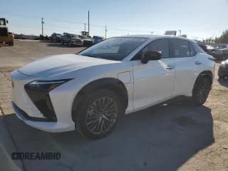 ✅ 2023 Lexus RZ 450e Premium • VIN: JTJAAAAB9PA014293 • Lot: 73701394. Wystawiony na Copart z przebiegiem 5 697 mil. Bezpłatny archiwum sprzedaży aukcyjnych z USA i szczegółowy raport historii pojazdu na DreamBid. Zdjęcie 1.