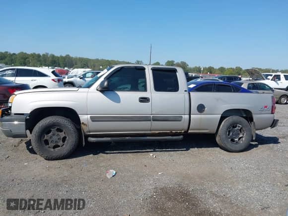 2004 Chevrolet Silverado 1500 z VIN 2GCEK19T441300993, wystawiony jako IAAI lot #43251806 z przebiegiem 143 240 mil mil oraz . Historia ofert i sprzedaży dostępna na DreamBid. Obrazek 13.