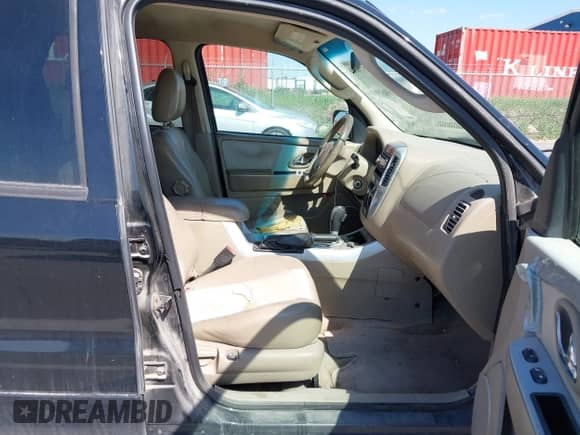 2006 Mercury Mariner Luxury z VIN 4M2YU56186DJ00220, wystawiony jako IAAI lot #42174056 z przebiegiem 208 820 mil mil oraz . Historia ofert i sprzedaży dostępna na DreamBid. Obrazek 5.