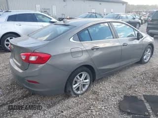 ✅ 2017 Chevrolet Cruze LT • VIN: 1G1BE5SM7H7175896 • Lot: 43538085. Listed on IAAI with 77,730 mi. Free auction sales archive from the USA and detailed vehicle history report at DreamBid. Image 4.