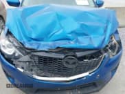 ✅ 2014 Mazda CX-5 Grand Touring • VIN: JM3KE2DY3E0343986 • Lot: 43373256. Wystawiony na IAAI z przebiegiem 171 454 mil. Bezpłatny archiwum sprzedaży aukcyjnych z USA i szczegółowy raport historii pojazdu na DreamBid. Zdjęcie 19.