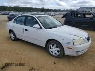 2004 Hyundai Elantra GLS z VIN KMHDN46D84U844298, wystawiony jako Copart lot #72906334 z przebiegiem 210 596 mil mil oraz Czysty tytuł • Clean title. Historia ofert i sprzedaży dostępna na DreamBid. Obrazek 4.