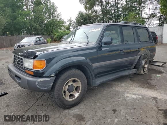 ✅ 1997 Toyota Land Cruiser • VIN: JT3HJ85J6V0185179 • Лот: 67175814. Опубликован ранее на Copart с пробегом 271 577 миль. Бесплатный доступ к архиву аукционных продаж из США и подробный отчёт об истории автомобиля на DreamBid. Изображение 1.