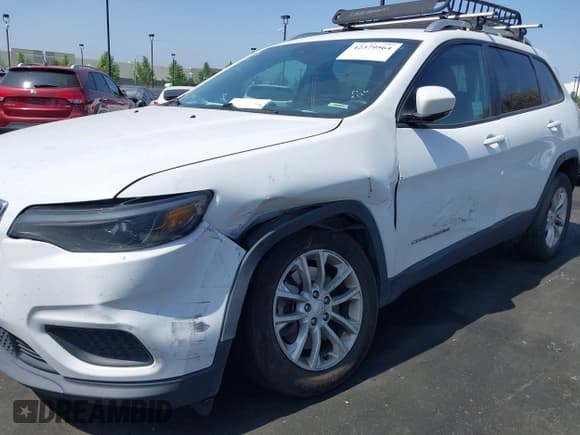 ✅ 2021 Jeep Cherokee Latitude • VIN: 1C4PJLCB0MD116324 • Lot: 42379564. Listed on IAAI with 198,504 mi. Free auction sales archive from the USA and detailed vehicle history report at DreamBid. Image 12.