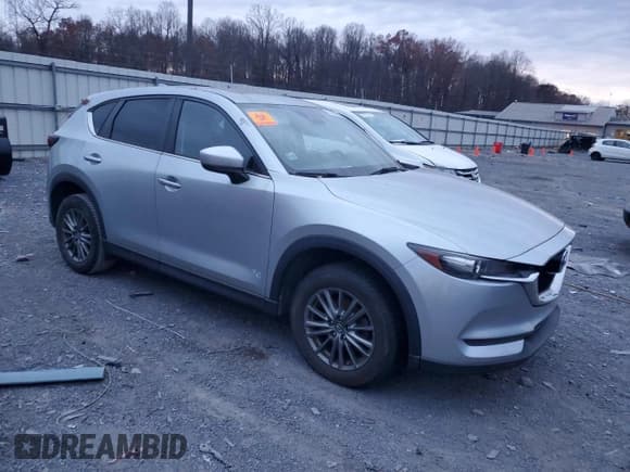 ✅ 2017 Mazda CX-5 Touring • VIN: JM3KFBCL5H0140492 • Лот: 93028675. Опубликован ранее на Copart с пробегом Не указан. Бесплатный доступ к архиву аукционных продаж из США и подробный отчёт об истории автомобиля на DreamBid. Изображение 4.