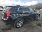 ✅ 2012 Cadillac SRX Performance Collection • VIN: 3GYFNBE31CS577198 • Lot: 81932555. Listed on Copart with 194,810 mi. Free auction sales archive from the USA and detailed vehicle history report at DreamBid. Image 3.