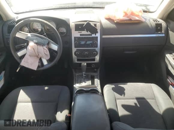 2010 Dodge Charger SXT с VIN 2B3CA3CV8AH309636, выставлен на аукционе Copart как лот 70725114 с пробегом 126 011 миль миль и Списание • Salvage title. История ставок и продаж доступна на DreamBid. Изображение 8.