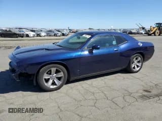 ✅ 2014 Dodge Challenger SXT • VIN: 2C3CDYAG8EH256275 • Lot: 71063714. Wystawiony na Copart z przebiegiem 126 638 mil. Bezpłatny archiwum sprzedaży aukcyjnych z USA i szczegółowy raport historii pojazdu na DreamBid. Zdjęcie 1.