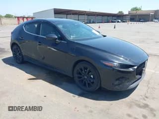 ✅ 2024 Mazda 3 S Premium • VIN: JM1BPAMM7R1656291 • Lot: 42216436. Listed on IAAI with 27,483 mi. Free auction sales archive from the USA and detailed vehicle history report at DreamBid. Image 1.