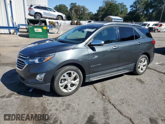 ✅ 2018 Chevrolet Equinox Premier • VIN: 3GNAXPEU6JS591795 • Лот: 85390305. Опубликован ранее на Copart с пробегом 187 641 миль. Бесплатный доступ к архиву аукционных продаж из США и подробный отчёт об истории автомобиля на DreamBid. Изображение 1.