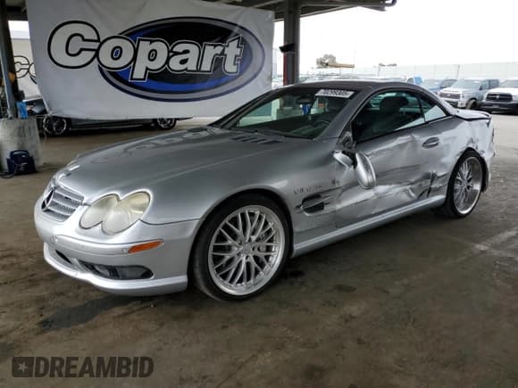 ✅ 2004 Mercedes-Benz SL 55/63 AMG • VIN: WDBSK74F24F068103 • Лот: 70299305. Опубликован ранее на Copart с пробегом 161 232 миль. Бесплатный доступ к архиву аукционных продаж из США и подробный отчёт об истории автомобиля на DreamBid. Изображение 1.