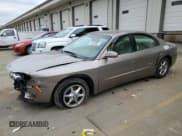 ✅ 2002 Oldsmobile Aurora • VIN: 1G3GR64H224169066 • Лот: 44636565. Опубликован ранее на Copart с пробегом 69 419 миль. Бесплатный доступ к архиву аукционных продаж из США и подробный отчёт об истории автомобиля на DreamBid. Изображение 1.