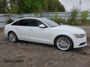✅ 2015 Audi A6 • VIN: WAUHFCFC7FN004706 • Лот: 56375125. Опубликован ранее на Copart с пробегом 169 596 миль. Бесплатный доступ к архиву аукционных продаж из США и подробный отчёт об истории автомобиля на DreamBid. Изображение 4.