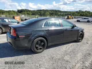 2009 Chevrolet Malibu 1LS z VIN 1G1ZG57BX9F252767, wystawiony jako Copart lot #70364215 z przebiegiem 142 185 mil mil oraz Szkoda całkowita • Salvage title. Historia ofert i sprzedaży dostępna na DreamBid. Obrazek 3.