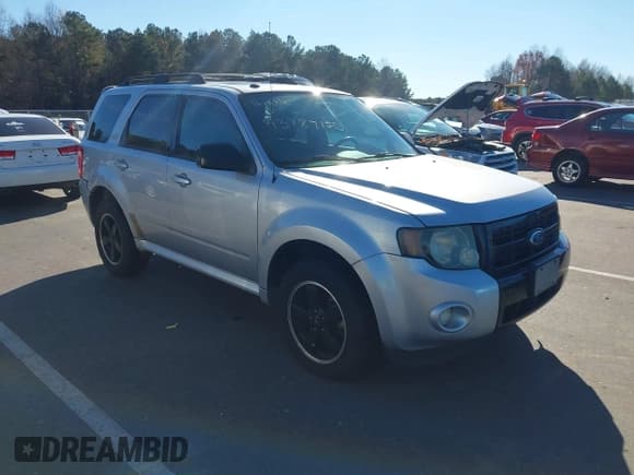 ✅ 2011 Ford Escape XLT • VIN: 1FMCU0D71BKA42950 • Lot: 43787150. Listed on IAAI with 257,927 mi. Free auction sales archive from the USA and detailed vehicle history report at DreamBid. Image 1.