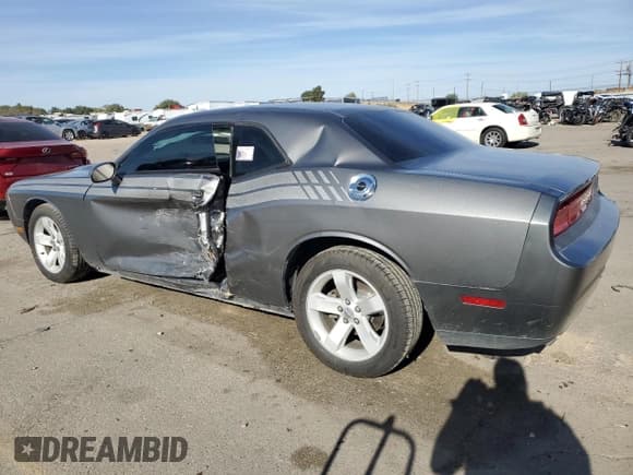 ✅ 2012 Dodge Challenger SXT • VIN: 2C3CDYAG0CH228029 • Lot: 77434704. Wystawiony na Copart z przebiegiem 133 272 mil. Bezpłatny archiwum sprzedaży aukcyjnych z USA i szczegółowy raport historii pojazdu na DreamBid. Zdjęcie 2.