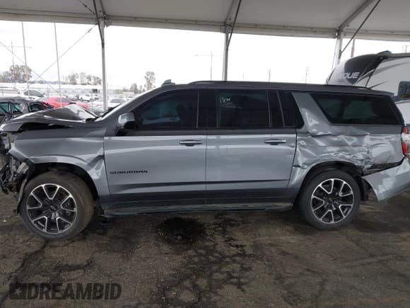 ✅ 2021 Chevrolet Suburban RST • VIN: 1GNSCEKD0MR253468 • Lot: 41459452. Listed on IAAI with 36,005 mi. Free auction sales archive from the USA and detailed vehicle history report at DreamBid. Image 14.