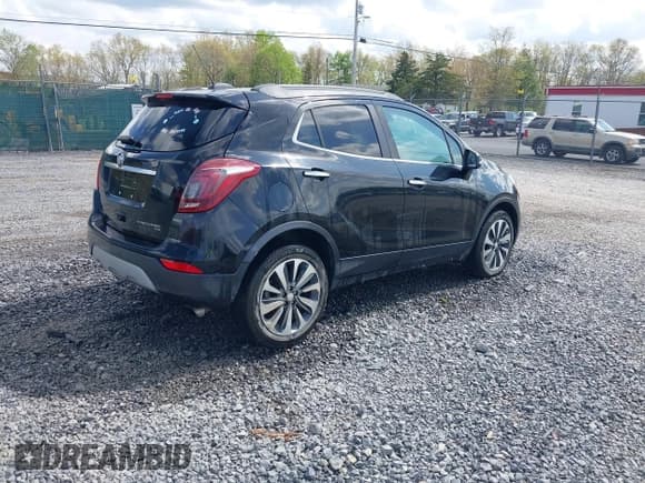 ✅ 2019 Buick Encore Essence • VIN: KL4CJGSM9KB700703 • Lot: 42150103. Listed on IAAI with 128,348 mi. Free auction sales archive from the USA and detailed vehicle history report at DreamBid. Image 4.