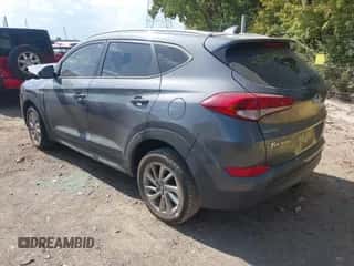 2018 Hyundai Tucson SEL z VIN KM8J33A42JU756384, wystawiony jako IAAI lot #43377460 z przebiegiem 72 273 mil mil oraz . Historia ofert i sprzedaży dostępna na DreamBid. Obrazek 3.