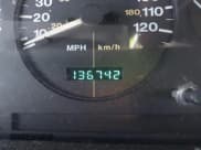 ✅ 1996 Jeep Grand Cherokee Laredo • VIN: 1J4FX58S2TC397006 • Lot: 41836108. Wystawiony na IAAI z przebiegiem 136 742 mil. Bezpłatny archiwum sprzedaży aukcyjnych z USA i szczegółowy raport historii pojazdu na DreamBid. Zdjęcie 7.