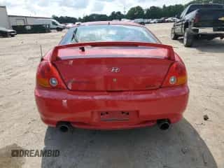 ✅ 2004 Hyundai Tiburon GT • VIN: KMHHN65F84U134351 • Лот: 68748105. Опубликован ранее на Copart с пробегом Не указан. Бесплатный доступ к архиву аукционных продаж из США и подробный отчёт об истории автомобиля на DreamBid. Изображение 6.