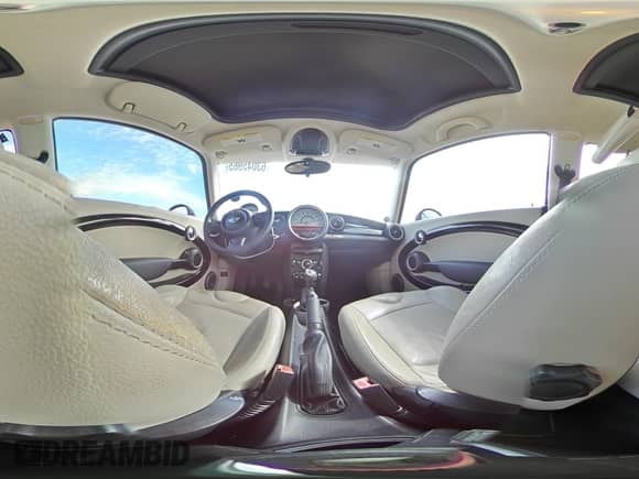 2012 MINI Hardtop with VIN WMWSU3C52CT367682, listed as a Copart auction lot 63045965 with 124,683 mi miles and Salvage title. Bid and sale history available at DreamBid. Image 14.