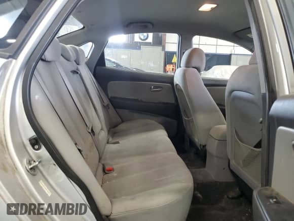 2009 Hyundai Elantra GLS z VIN KMHDU46D79U717424, wystawiony jako Copart lot #71997984 z przebiegiem 127 322 mil mil oraz Szkoda całkowita • Salvage title. Historia ofert i sprzedaży dostępna na DreamBid. Obrazek 10.