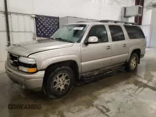 2003 Chevrolet Suburban Z71 z VIN 3GNFK16Z93G197080, wystawiony jako Copart lot #79689684 z przebiegiem 254 809 mil mil oraz Szkoda całkowita • Salvage title. Historia ofert i sprzedaży dostępna na DreamBid. Obrazek 1.
