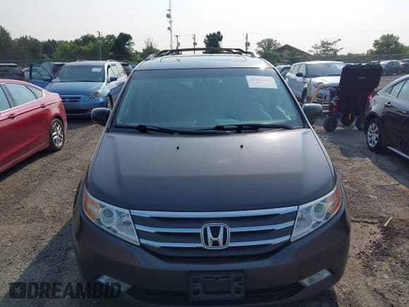 ✅ 2012 Honda Odyssey Touring • VIN: 5FNRL5H92CB059118 • Lot: 42415626. Listed on IAAI with 171,513 mi. Free auction sales archive from the USA and detailed vehicle history report at DreamBid. Image 12.