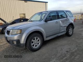 ✅ 2010 Mazda Tribute Sport • VIN: 4F2CY0C77AKM02764 • Лот: 75112623. Опубликован ранее на Copart с пробегом 147 590 миль. Бесплатный доступ к архиву аукционных продаж из США и подробный отчёт об истории автомобиля на DreamBid. Изображение 1.