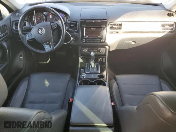 ✅ 2013 Volkswagen Touareg Sport • VIN: WVGEF9BP6DD009783 • Lot: 93393505. Listed on Copart with 104,656 mi. Free auction sales archive from the USA and detailed vehicle history report at DreamBid. Image 8.