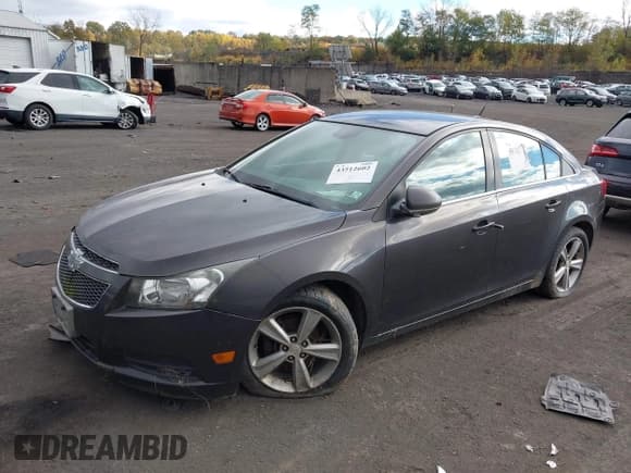 ✅ 2014 Chevrolet Cruze 2LT • VIN: 1G1PE5SB0E7422014 • Lot: 43512602. Listed on IAAI with 126,007 mi. Free auction sales archive from the USA and detailed vehicle history report at DreamBid. Image 2.