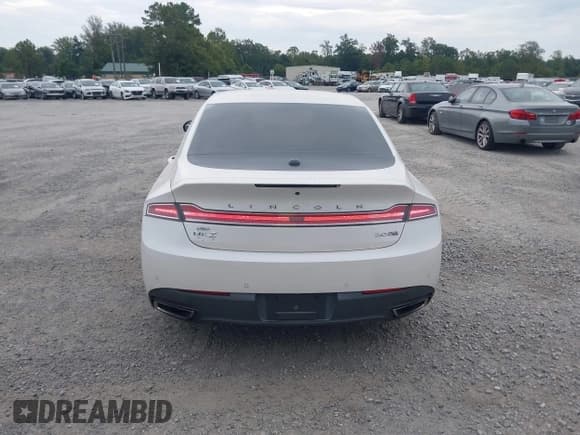 ✅ 2016 Lincoln MKZ • VIN: 3LN6L2J97GR616228 • Lot: 43220172. Listed on IAAI with 124,962 mi. Free auction sales archive from the USA and detailed vehicle history report at DreamBid. Image 16.