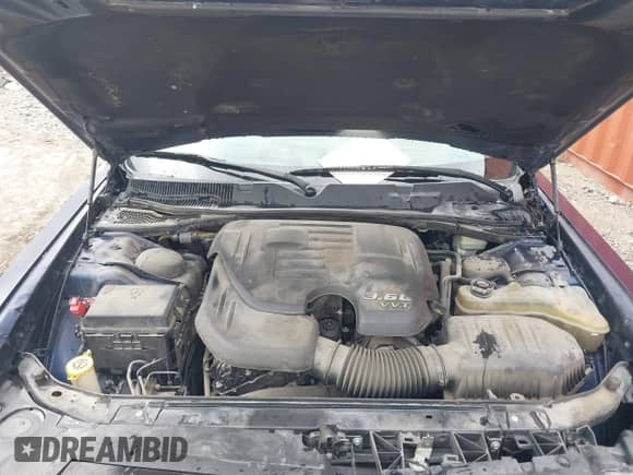 2014 Dodge Challenger SXT z VIN 2C3CDYAG0EH313973, wystawiony jako IAAI lot #43497087 z przebiegiem 136 844 mil mil oraz . Historia ofert i sprzedaży dostępna na DreamBid. Obrazek 10.