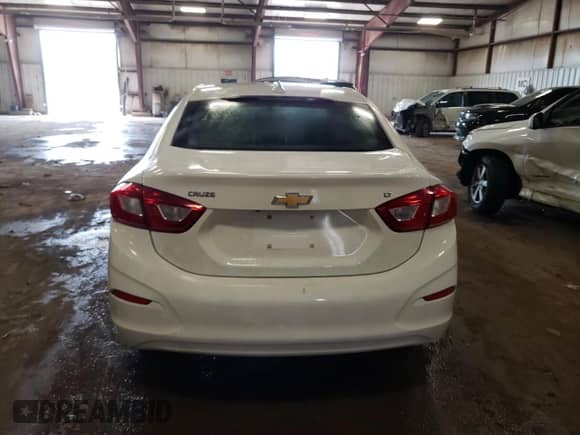 2018 Chevrolet Cruze LT с VIN 1G1BE5SM0J7153289, выставлен на аукционе Copart как лот 61331505 с пробегом 87 626 миль миль и Чистый • Clean title. История ставок и продаж доступна на DreamBid. Изображение 6.
