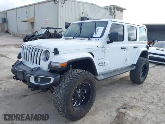 ✅ 2021 Jeep Wrangler Unlimited Sahara • VIN: 1C4HJXEN3MW717895 • Lot: 41472929. Listed on IAAI with 58,001 mi. Free auction sales archive from the USA and detailed vehicle history report at DreamBid. Image 2.