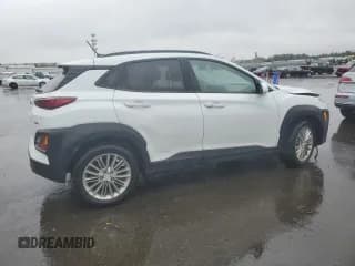 ✅ 2019 Hyundai Kona SEL • VIN: KM8K2CAA4KU368281 • Лот: 48153904. Опубликован ранее на Copart с пробегом 53 202 миль. Бесплатный доступ к архиву аукционных продаж из США и подробный отчёт об истории автомобиля на DreamBid. Изображение 3.