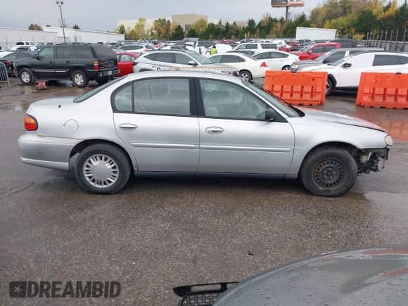 2003 Chevrolet Malibu z VIN 1G1ND52J43M508250, wystawiony jako IAAI lot #40873922 z przebiegiem 217 980 mil mil oraz . Historia ofert i sprzedaży dostępna na DreamBid. Obrazek 14.