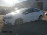 ✅ 2016 Chevrolet Cruze Premier • VIN: 1G1BG5SM9G7290993 • Lot: 89860365. Wystawiony na Copart z przebiegiem 136 118 mil. Bezpłatny archiwum sprzedaży aukcyjnych z USA i szczegółowy raport historii pojazdu na DreamBid. Zdjęcie 1.