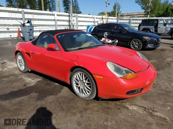 ✅ 2000 Porsche Boxster • VIN: WP0CA2989YU627606 • Lot: 84741325. Listed on Copart with Not provided. Free auction sales archive from the USA and detailed vehicle history report at DreamBid. Image 4.
