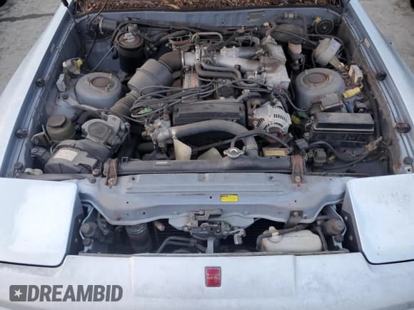 ✅ 1986 Toyota Supra • VIN: JT2MA70L4G0016772 • Lot: 85806484. Wystawiony na Copart z przebiegiem 128 504 mil. Bezpłatny archiwum sprzedaży aukcyjnych z USA i szczegółowy raport historii pojazdu na DreamBid. Zdjęcie 11.