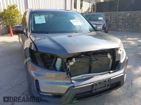 ✅ 2021 Honda Ridgeline RTL-E • VIN: 5FPYK3F73MB024472 • Lot: 43197458. Listed on IAAI with 168,707 mi. Free auction sales archive from the USA and detailed vehicle history report at DreamBid. Image 6.